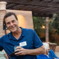 Man holding up arm for camera